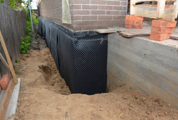 Happy homeowners after waterproofing job in Worthington